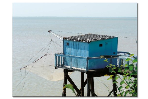 Wandbild: Hütte mit Netz vor Meer 2