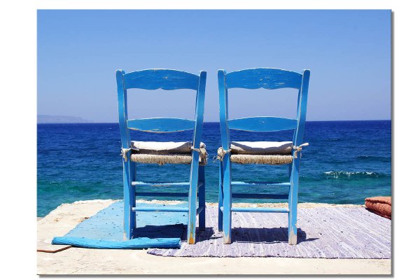 Wandbild: Kreta blaue Stühle am Meer